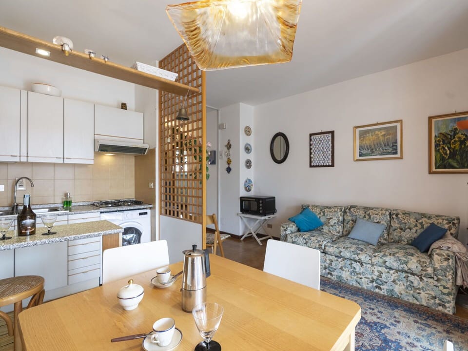 Table, Furniture, Picture Frame, Property, Cabinetry, Couch, Countertop, Tableware, Lighting, Interior Design