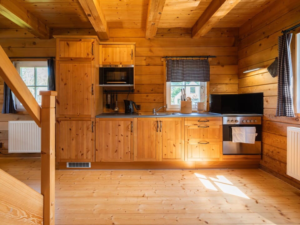 Cabinetry, Window, Countertop, Wood, Interior Design, Kitchen, Flooring, Floor, Wood Stain, Wall