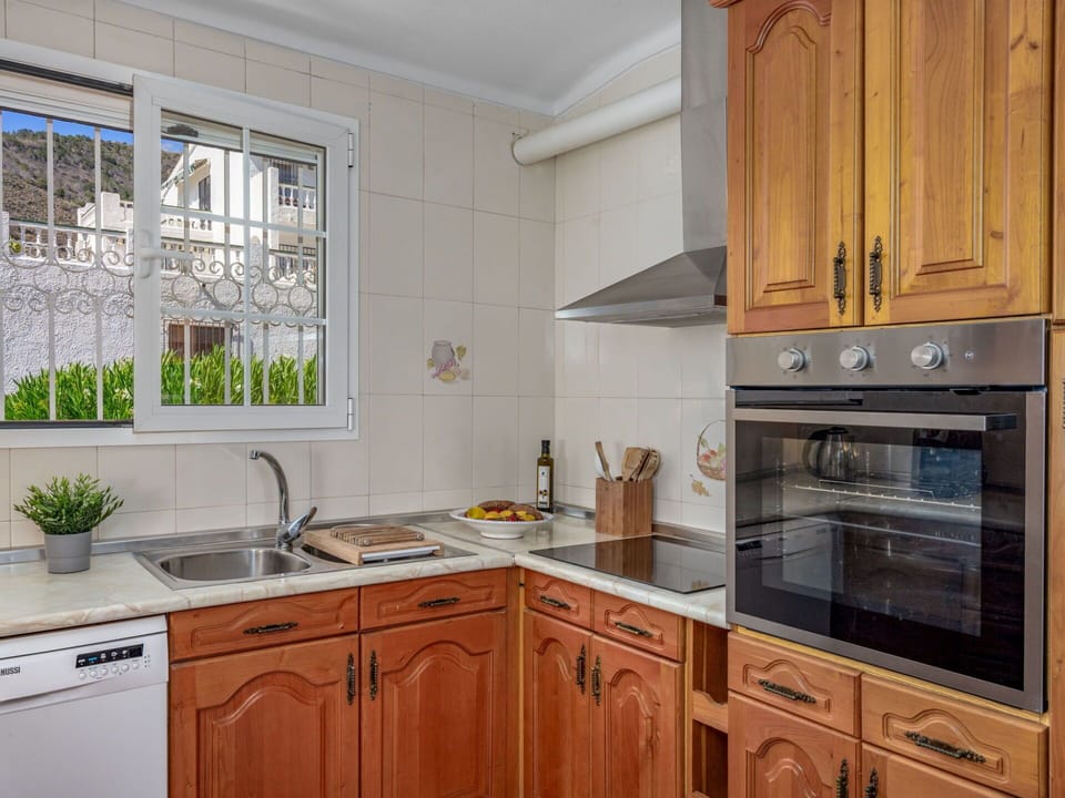 Cabinetry, Countertop, Furniture, Kitchen Sink, Property, Sink, Window, Kitchen, Plant, Wood