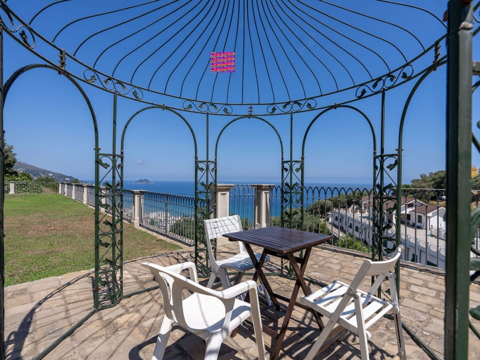 Water, Sky, Property, Table, Plant, Azure, Shade, Chair, Body Of Water, Outdoor Furniture