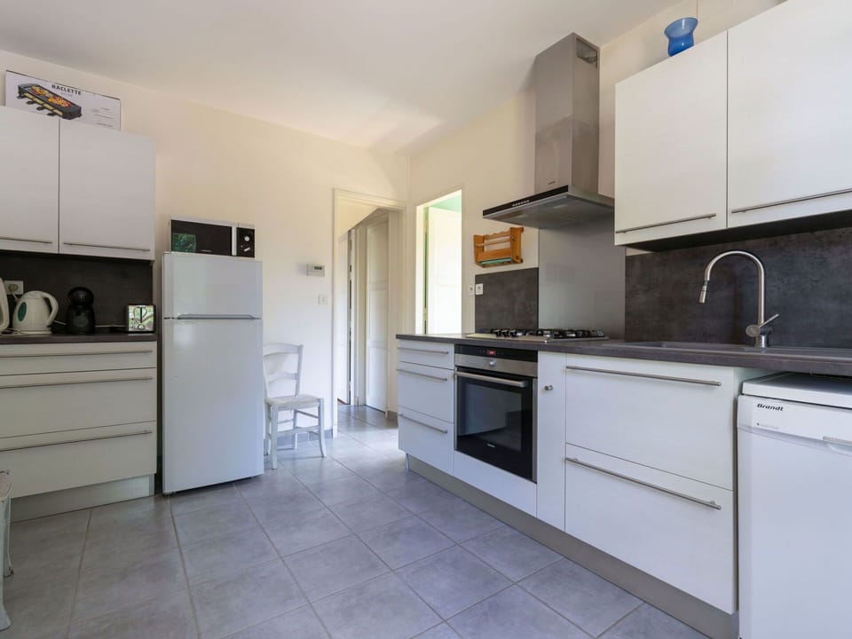 Cabinetry, Countertop, Property, Building, Sink, Kitchen Sink, Kitchen Appliance, Kitchen Stove, Kitchen, Home Appliance