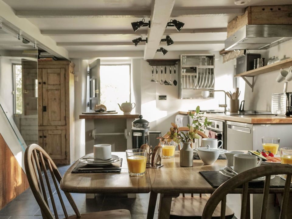 Table, Furniture, Property, Chair, Cabinetry, Wood, Interior Design, Countertop, Lighting, Architecture