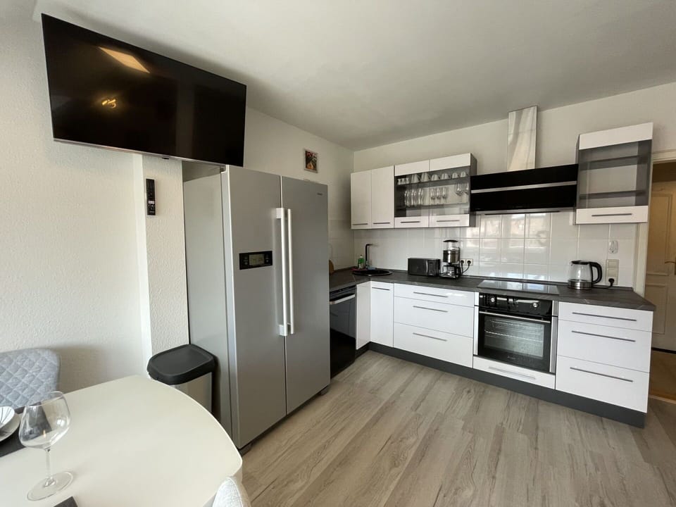 Cabinetry, Furniture, Countertop, Kitchen Stove, Wood, Flooring, Interior Design, Drawer, Kitchen, Home Appliance