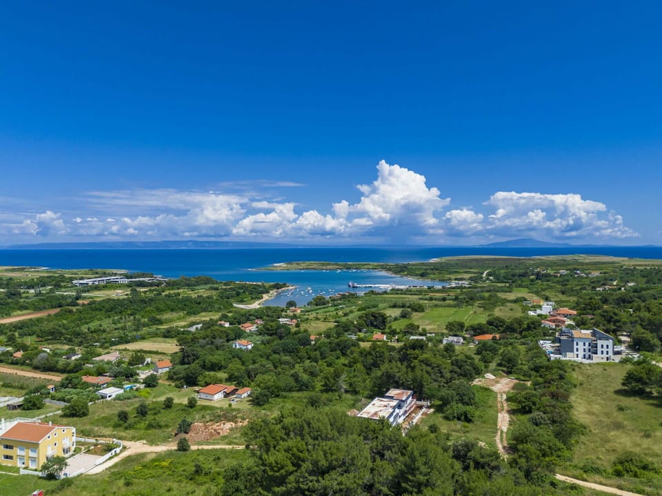 Cloud, Sky, Water, Plant, Nature, Blue, Natural Landscape, Vegetation, Tree, Building