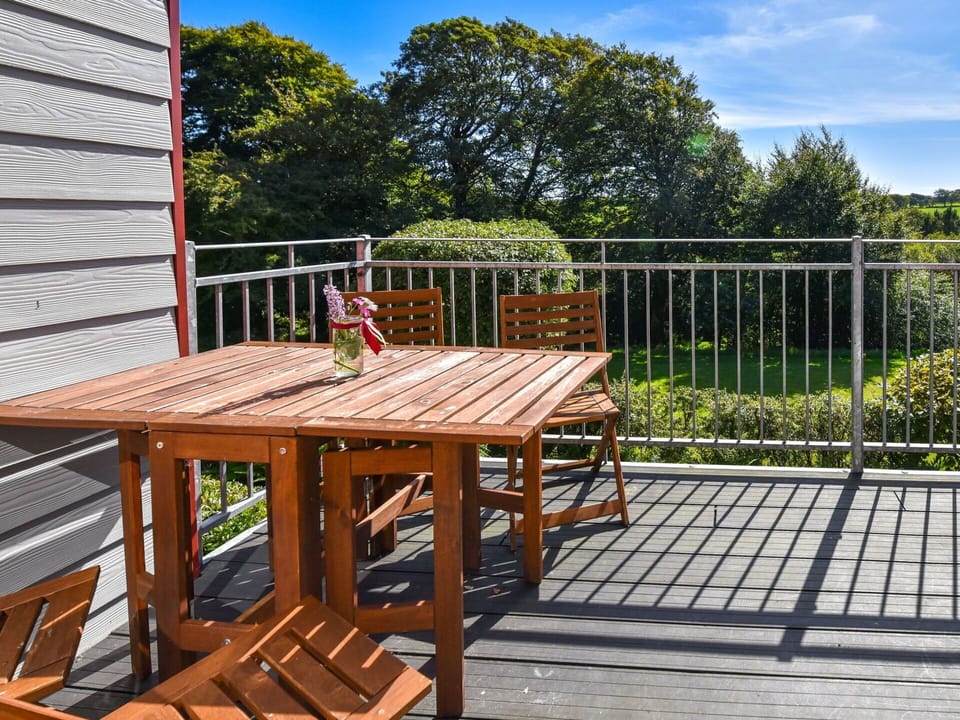 Table, Furniture, Sky, Plant, Property, Building, Tableware, Chair, Outdoor Table, Outdoor Furniture