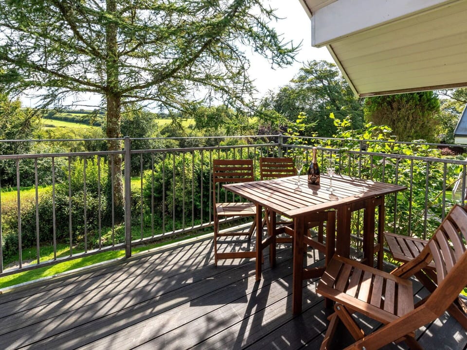 Table, Furniture, Sky, Plant, Property, Building, Tableware, Chair, Outdoor Table, Outdoor Furniture