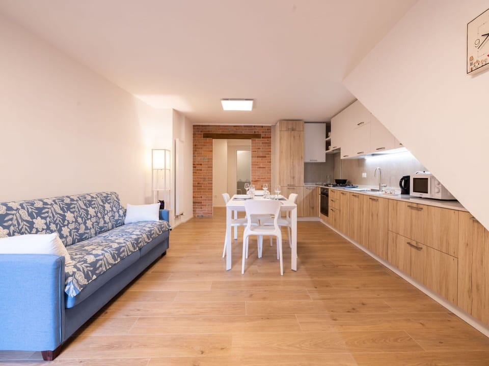 Furniture, Wood, Comfort, Building, Flooring, Table, Floor, Laminate Flooring, Hall, Couch