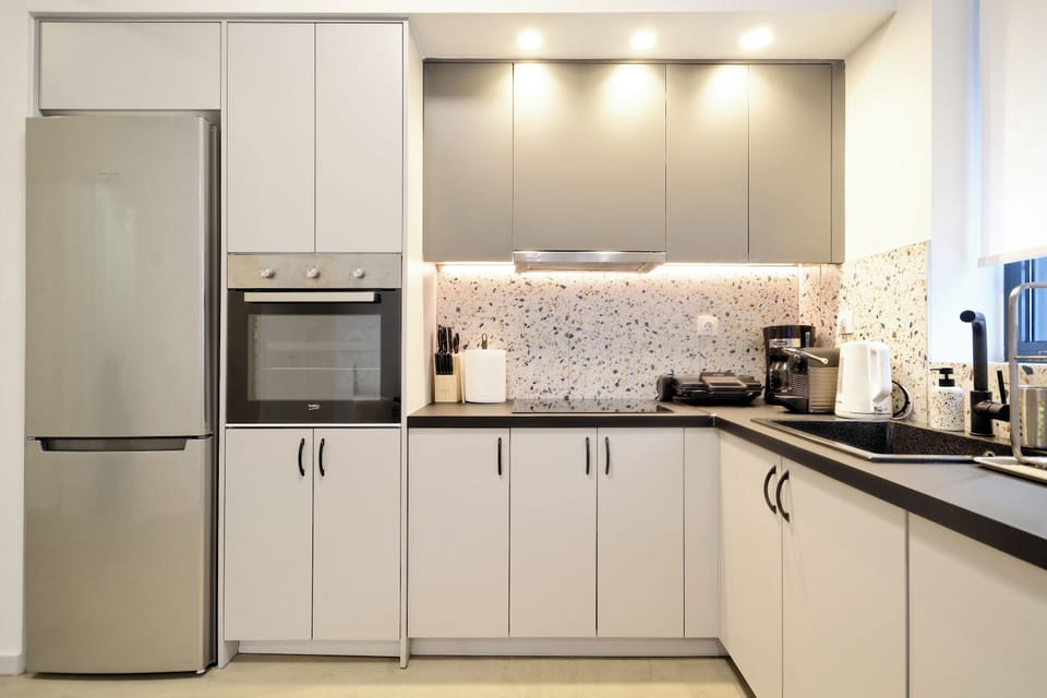 Fully equipped kitchen with modern appliances and ample counter space
