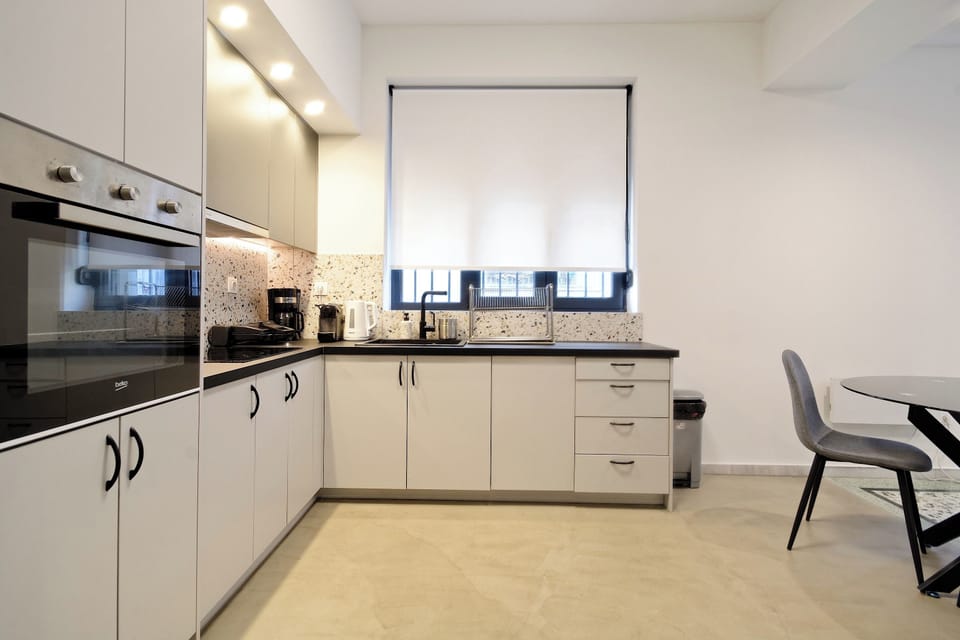 Fully equipped kitchen with modern appliances and ample counter space
