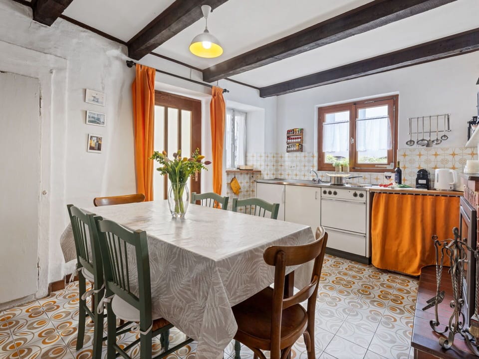Table, Furniture, Property, Chair, Window, Cabinetry, Wood, Plant, Interior Design, Orange