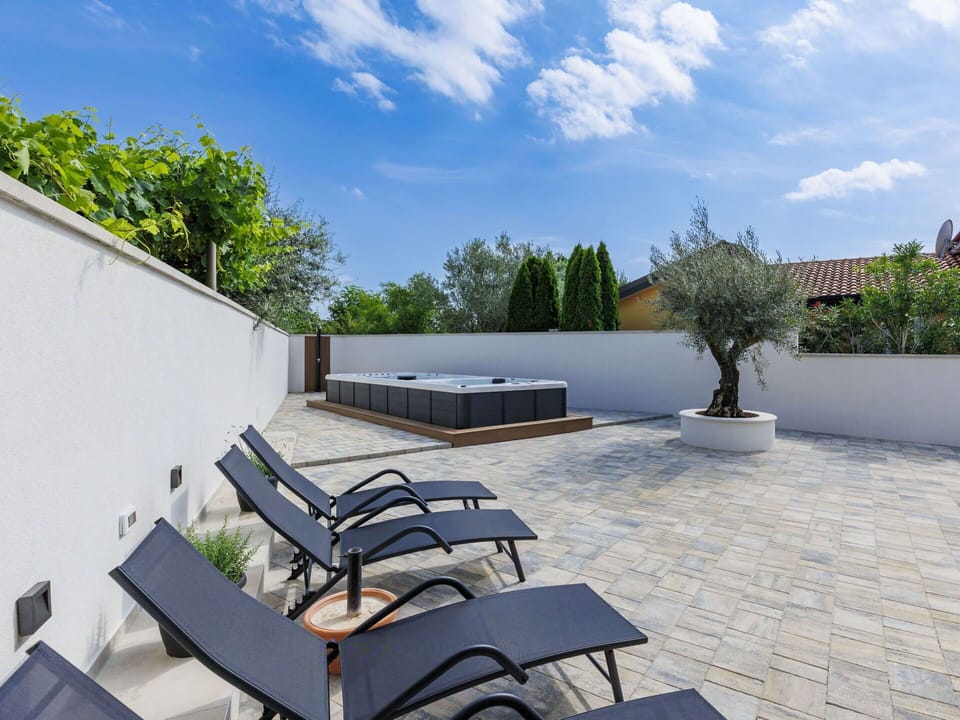 Outdoor Furniture, Flooring, Swimming Pool, Floor, Composite Material, Tile, Shade, Concrete, Flagstone, Courtyard