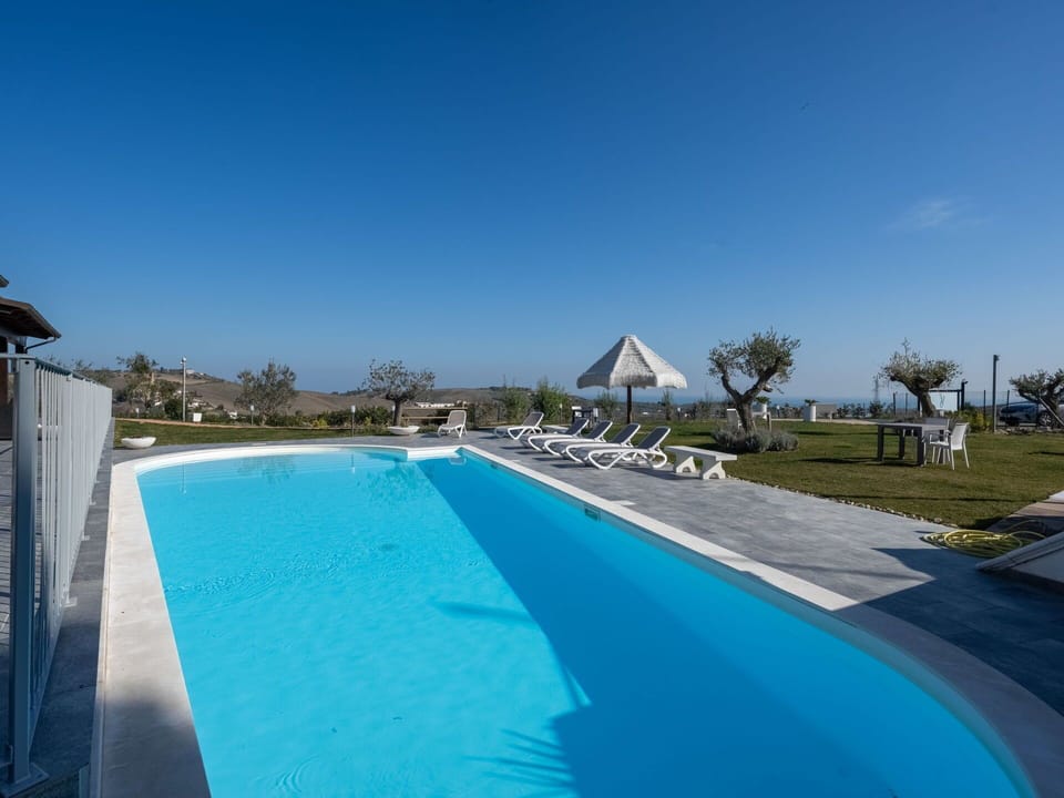 Blue, Swimming Pool, Resort, Outdoor Furniture, Shade, Resort Town, Landscaping, Eco Hotel, Umbrella, Thermae