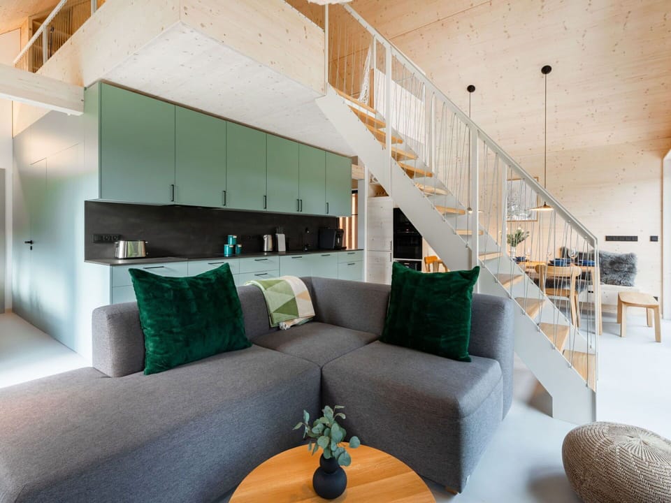 Furniture, Couch, Comfort, Living Room, Pillow, Floor, Flooring, Studio Couch, Real Estate, Decoration