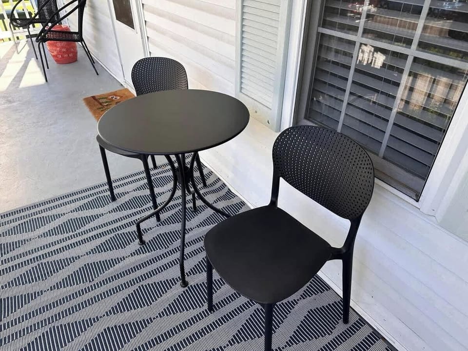 Start your morning with coffee or unwind in the evening breeze—this cozy patio spot is perfect for any moment of the day!