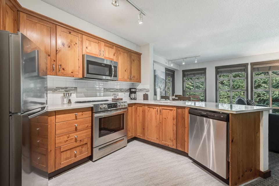 Modern kitchen with all the essentials and scenic views.