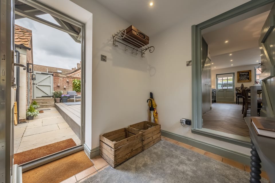 Ground floor: Two steps from hallway lead into the kitchen