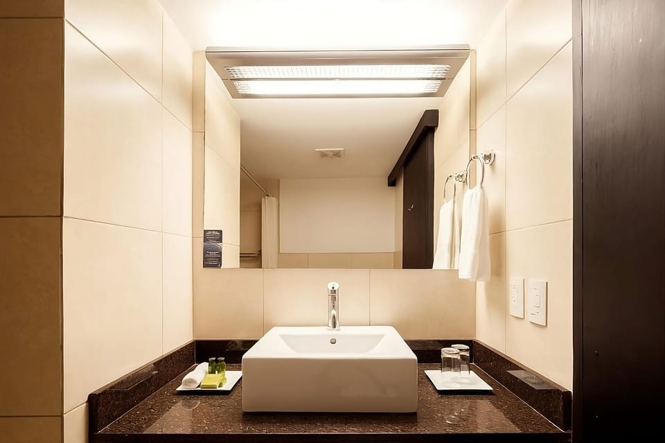Bathroom with a shower/ tub. The essential kit and towels are provided!