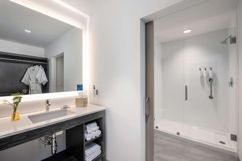 Start the day with spa-bright mirror light and fluffy towels.