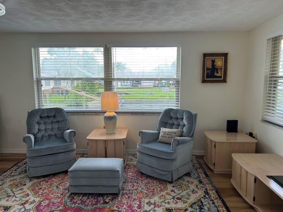 Back living room/sunroom on lake side. 
