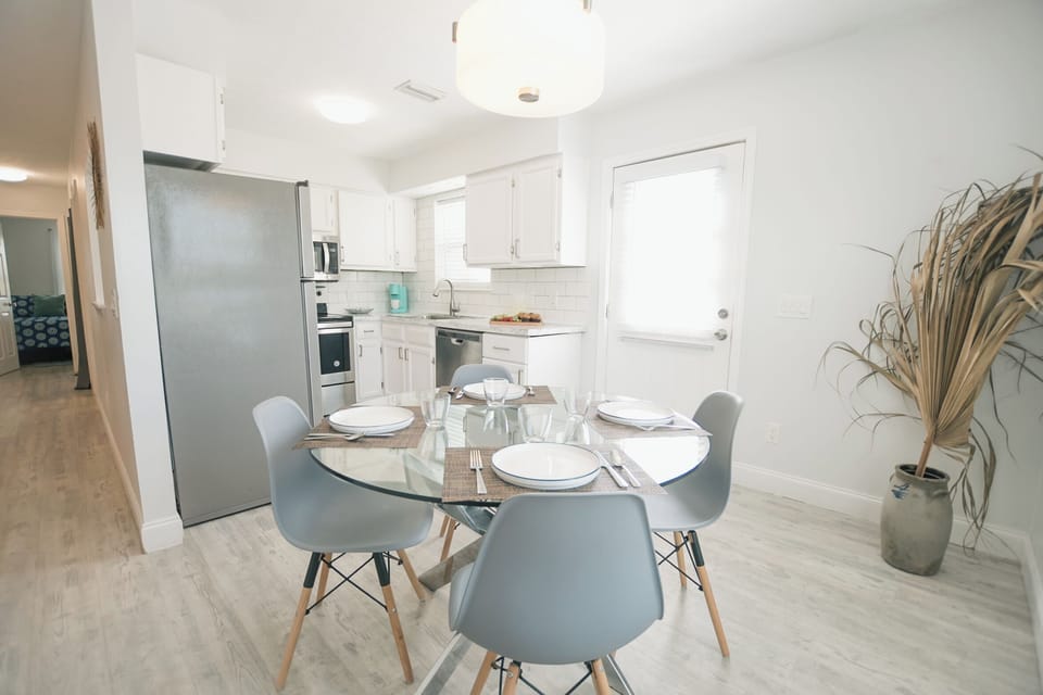 Open-concept dining room + kitchen.