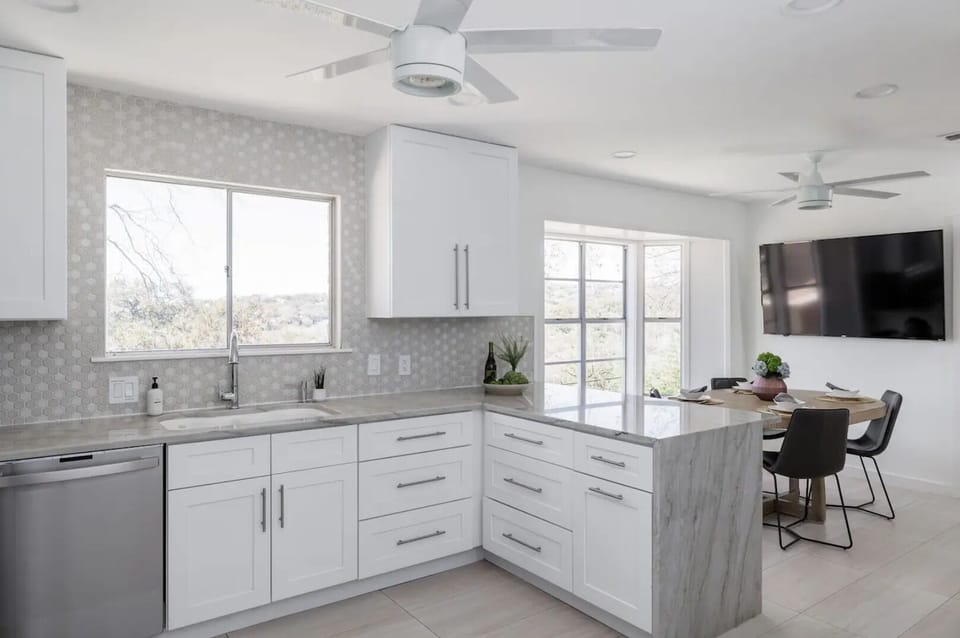Kitchen and dining area.  Note the windows.  Fantastic views.
