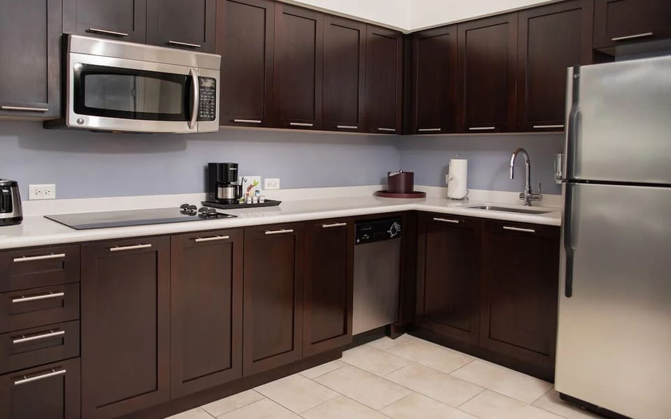 Cook comfortably with full-size appliances and sleek, ample counters.
