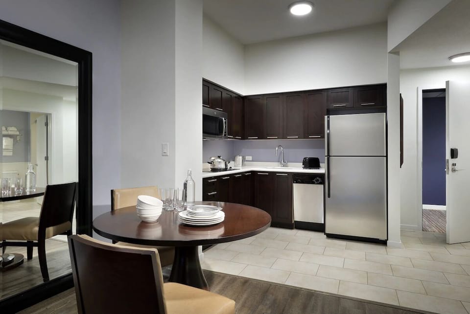 Gather for easy meals in a bright, modern kitchen nook.