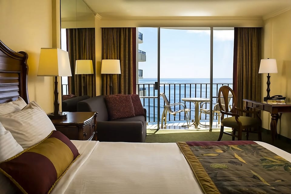 Drift to sleep with the balcony breeze and ocean hush.