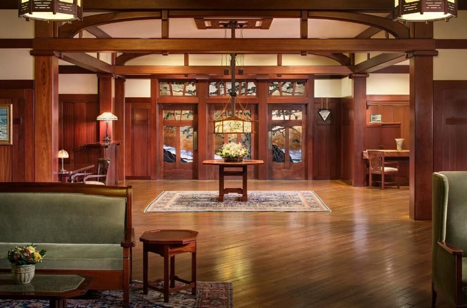 Step into a grand lobby with rich wood warmth.