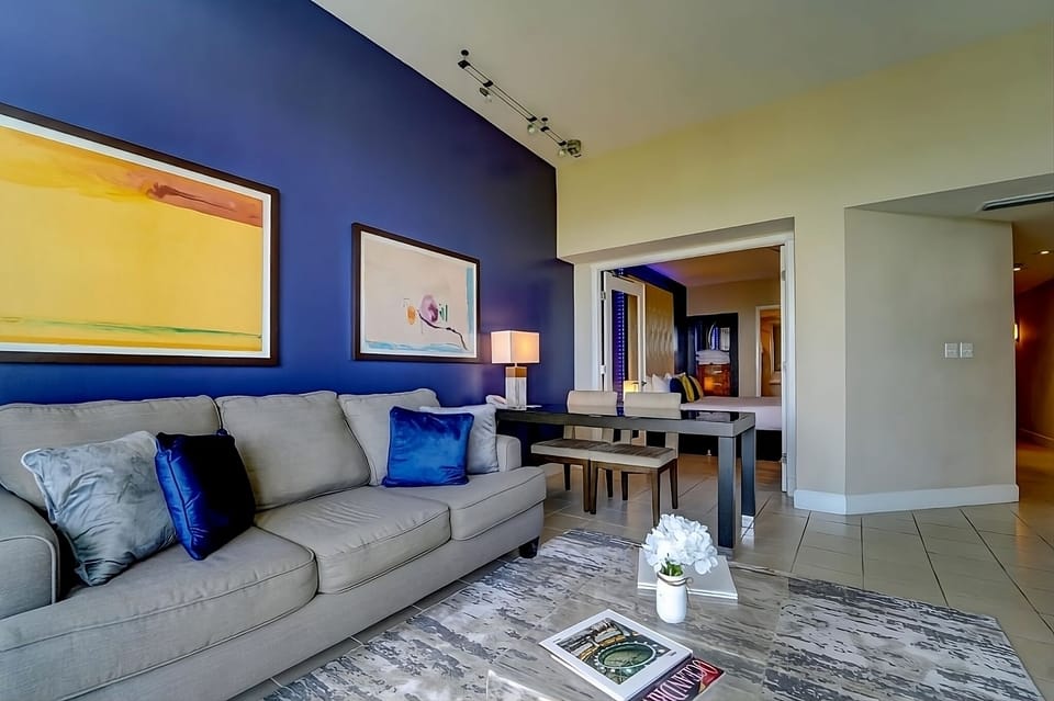 Gather for drinks in a stylish living and dining space.