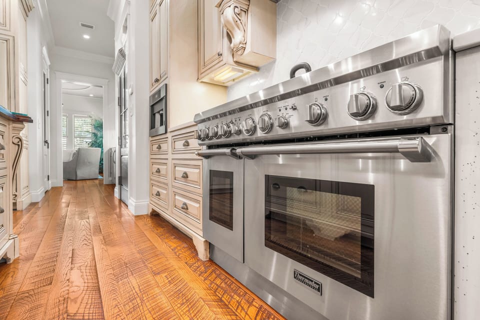 Luxurious appliances including a Sub Zero Side by Side Refrigerator/Freezer