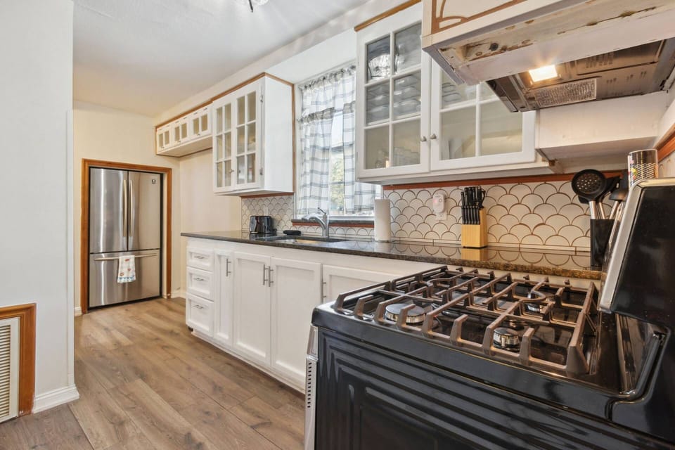 Kitchen with Stainless Steel Refrigerator/Freezer, Microwave, Stove & Oven
