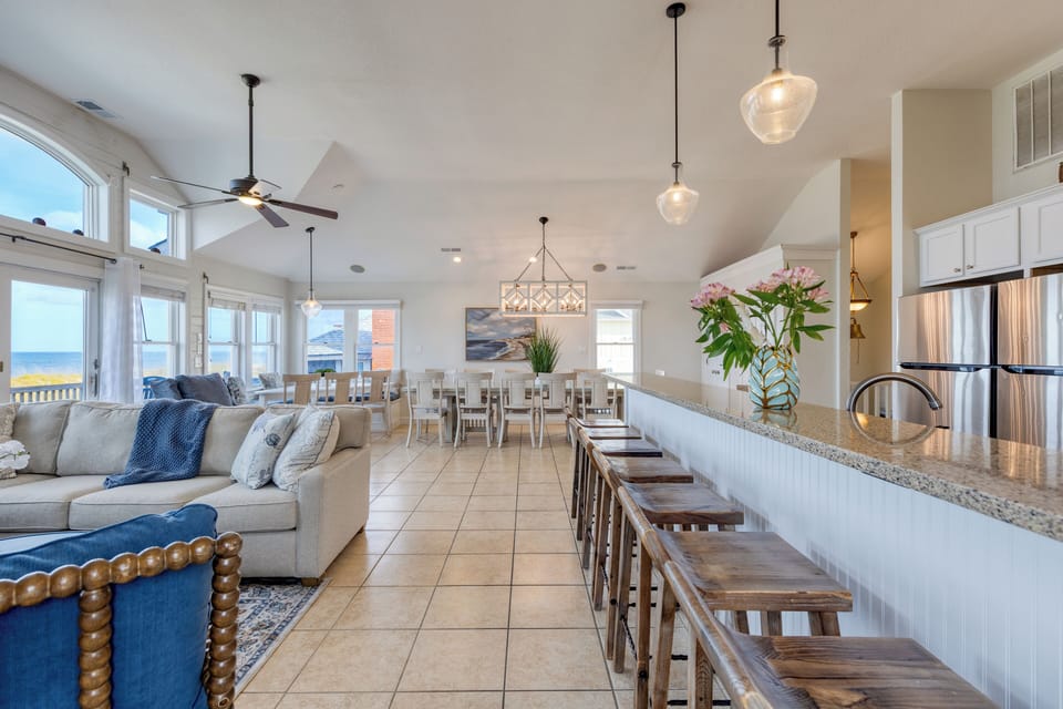 Thoughtfully connected to the kitchen, dining, and living areas.