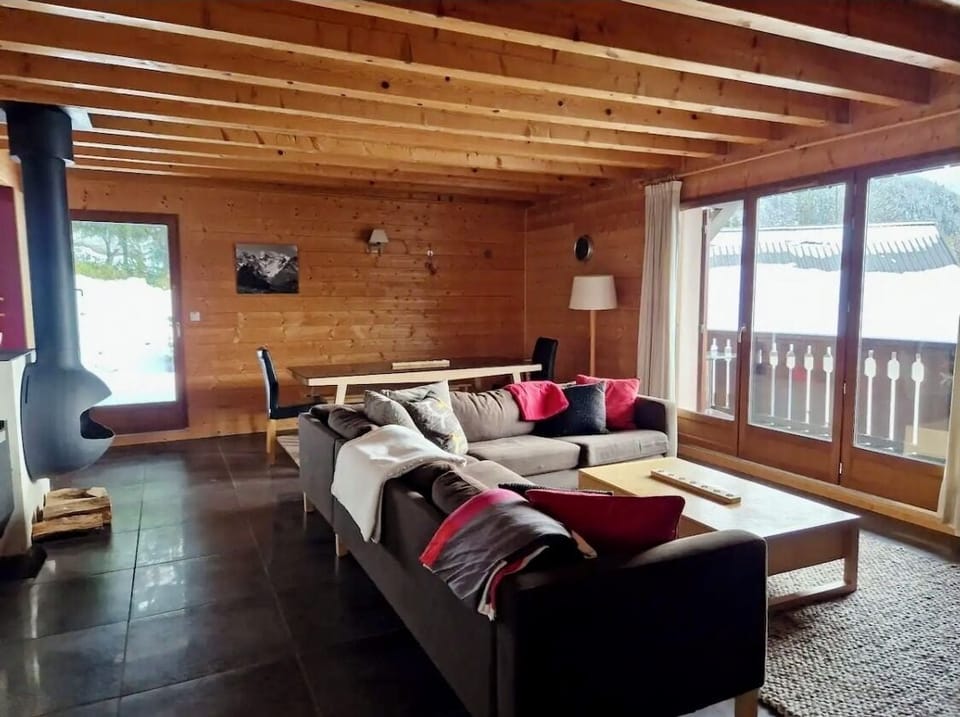 Large living room with wood burner