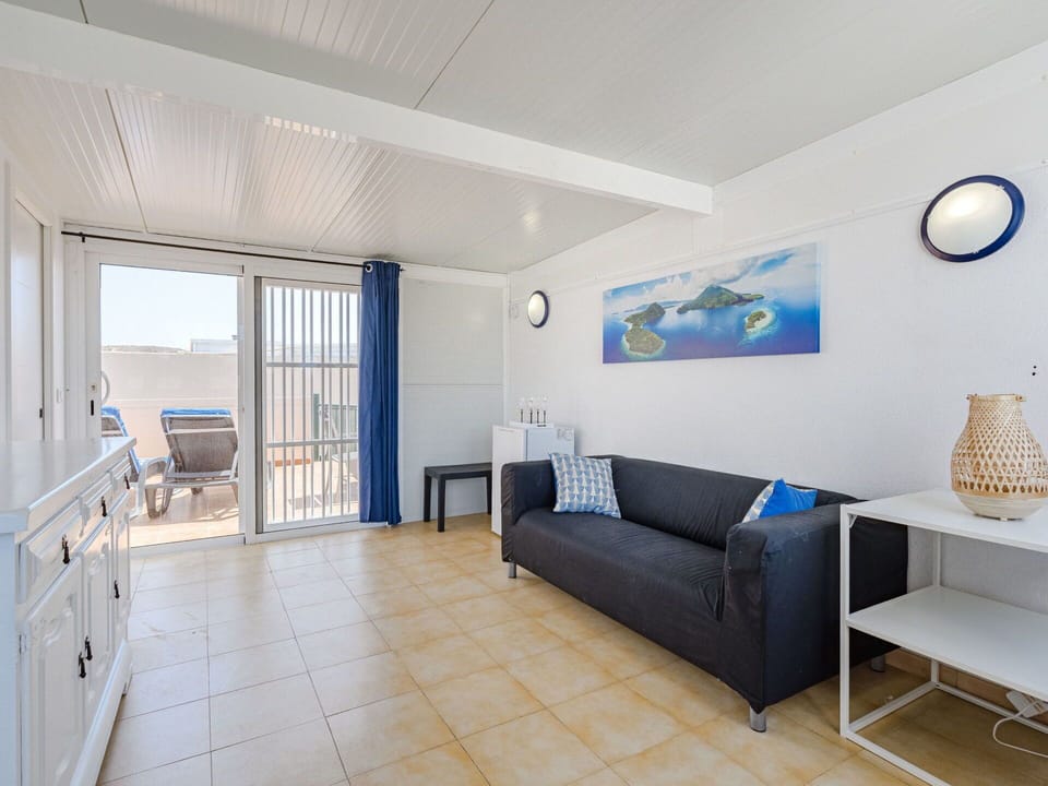 Furniture, Property, Building, Couch, Azure, Interior Design, Comfort, Lighting, House, Window