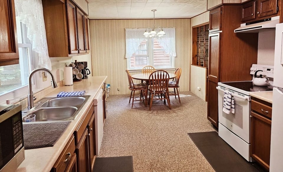 KITCHEN:  Full kitchen with all appliances including a dishwasher.