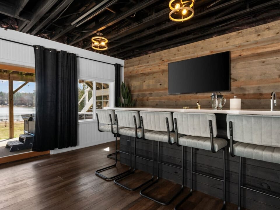 Entertain in style with this modern bar and open seating space!