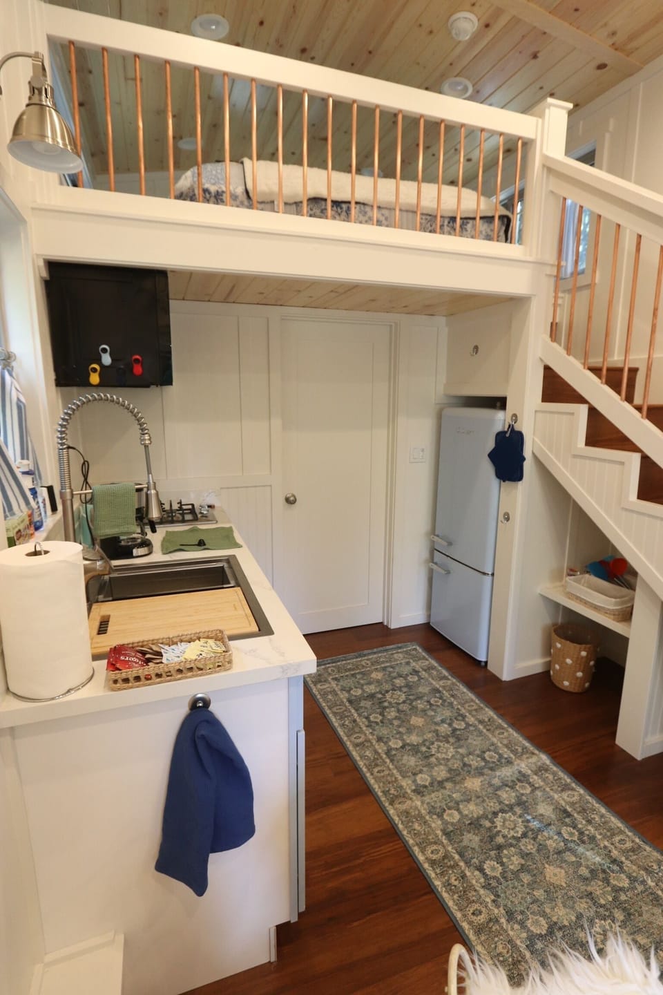 Amenities: tiny fridge, stove, coffee maker, toaster and microwave.