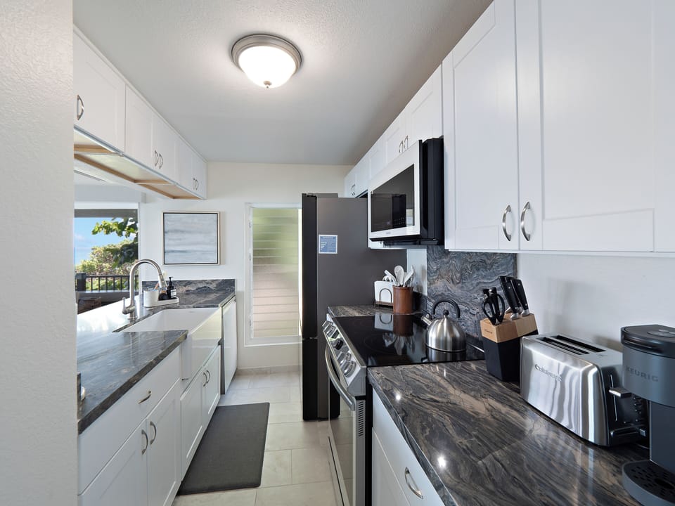 Whip up delicious meals with a view in the fully equipped kitchen.