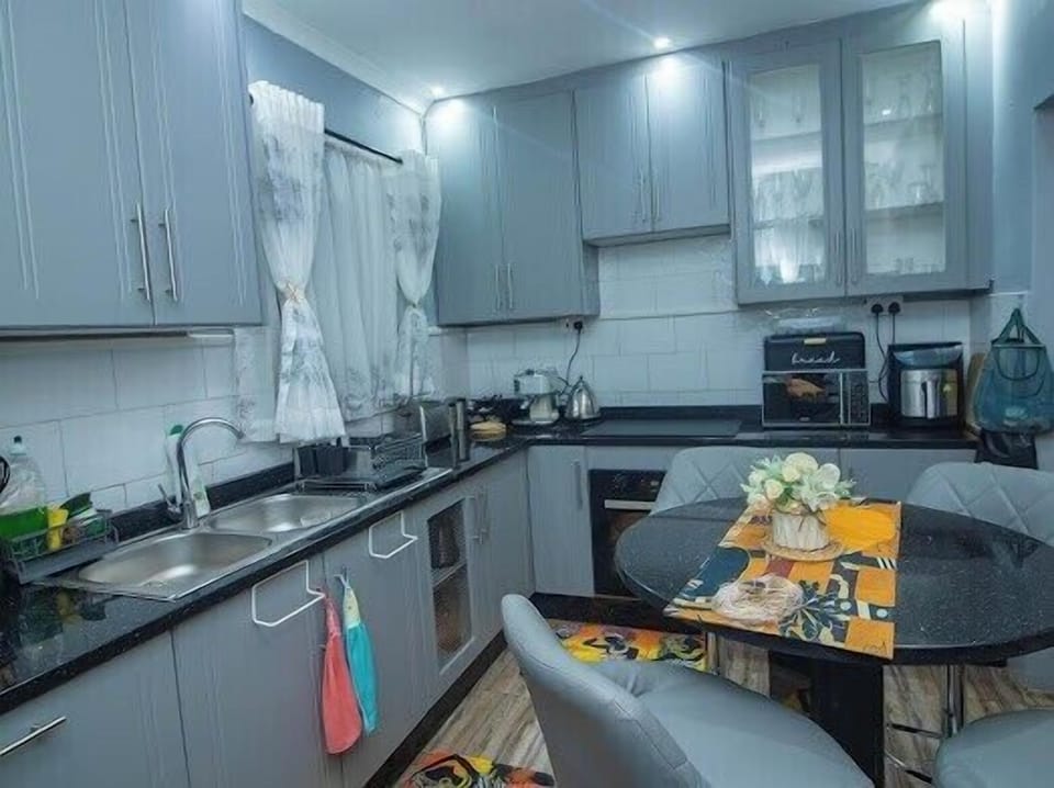 “Elegant, fully equipped kitchen designed for comfort and convenience.”