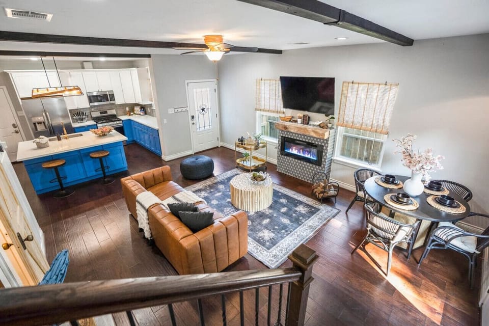 Modern comfort meets stylish design. Relax on the designer leather sofa or enjoy a movie night with a 65-inch HD TV!