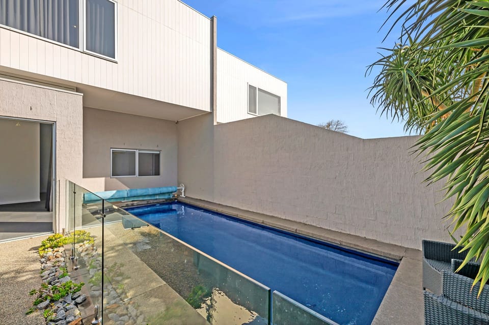 This stunning townhouse with a private pool is the perfect setting for a memorable coastal getaway