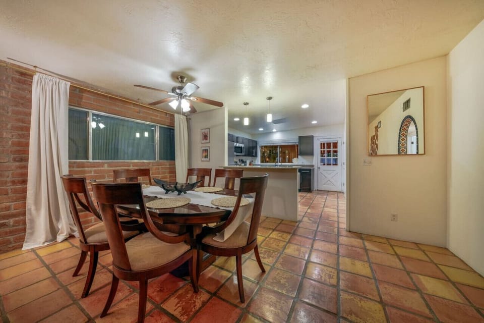 Dining area with seating for six, just off the updated and fully stocked kitchen
