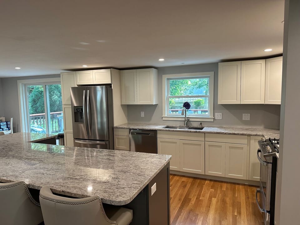 large sink, with disposal full fridge 
Beverage fridge in island!