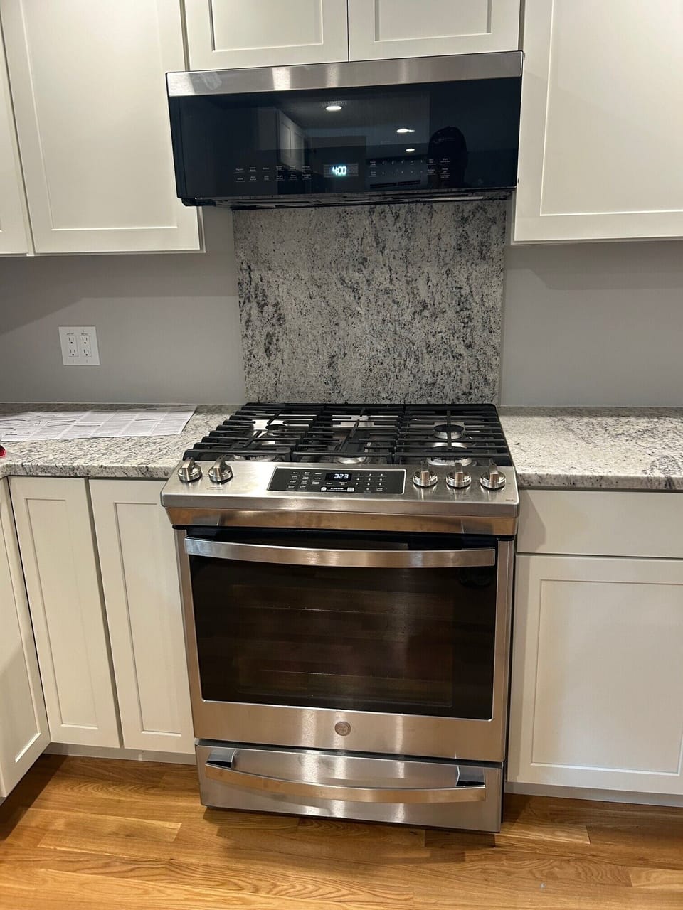 New Gas range with ventedmicrowave