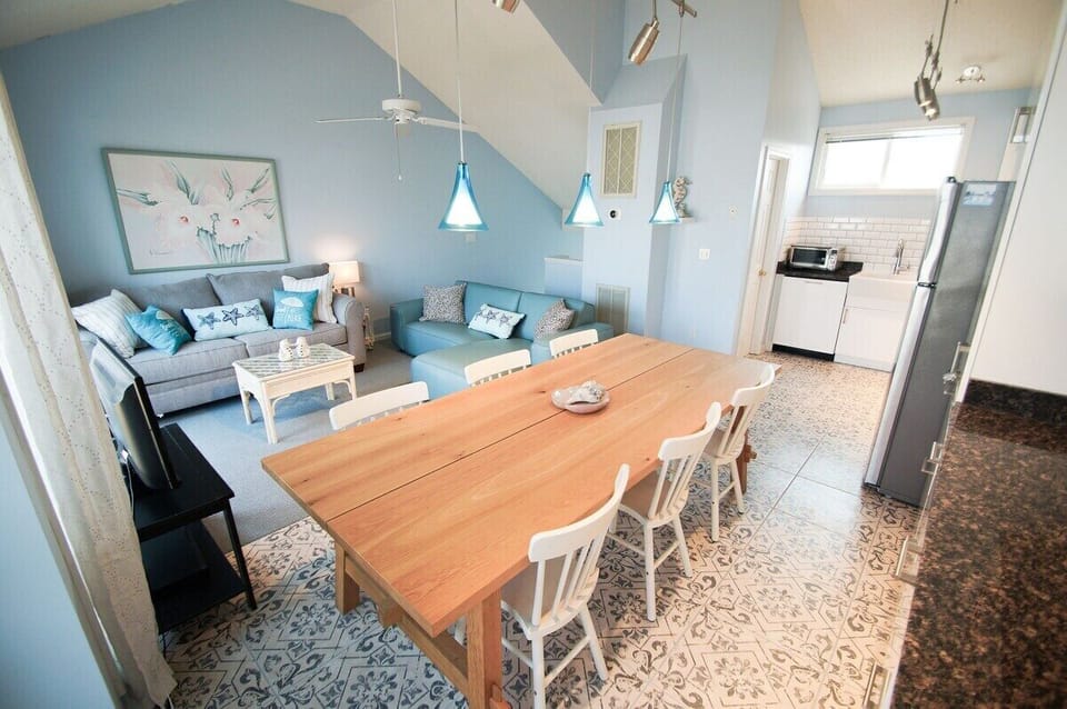 Dining room, living room and kitchen all on the same top floor