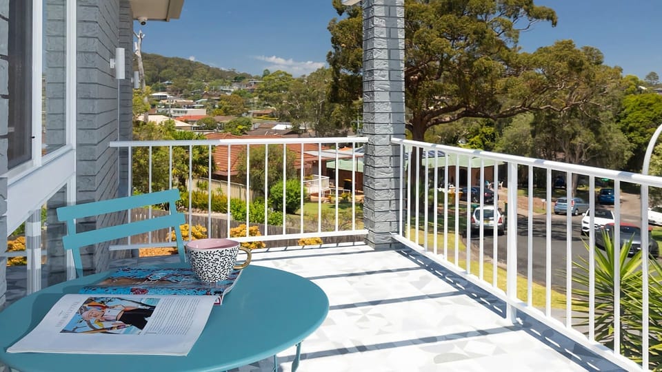Balcony bliss with sun-soaked vibes.