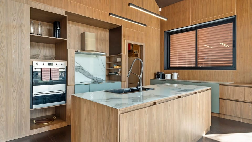 Fully equipped kitchen with everything needed for group cooking.