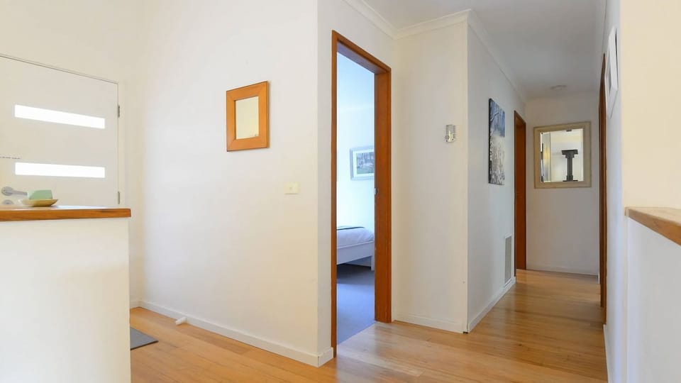 Step into the calm and welcoming entryway of this home, designed to provide a bright and open start to your stay