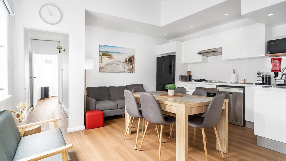 Open-plan living area combining the lounge, dining, and kitchen.